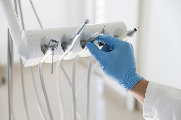 Professional Invisalign Clear Aligners technician working in Jamesport, NY